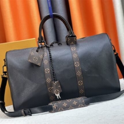 Louis Vuitton Taiga Leather Keepall Bandouliere 45 In Black And Monogram Macassar Canvas